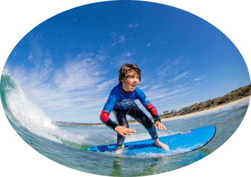 intermediate kid surfing