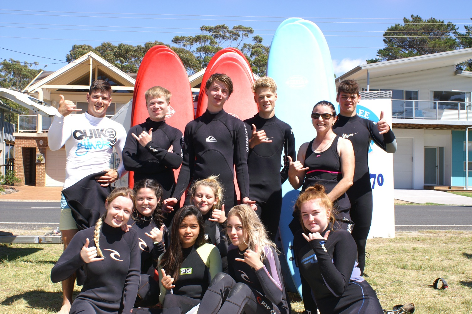 group surfing lessons are fun for the whole family